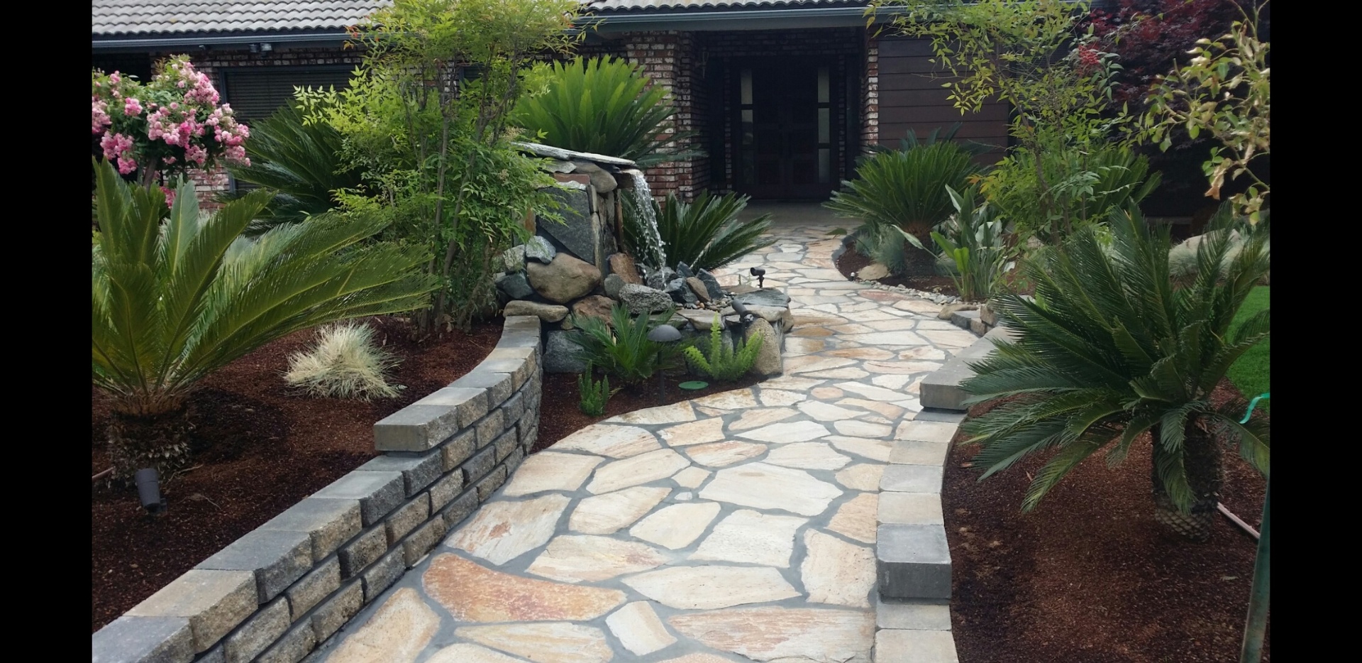 Flagstone entry with water feature